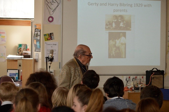 Harry Bibring talking to pupils